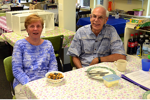 Couple seated at table in Shaw House kitchen