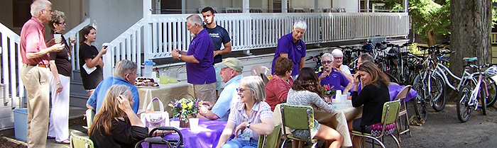 Ecumenical community denominational social in front of shaw and bird werner houses